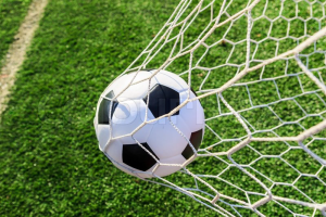 5659199-soccer-ball-in-goal-net